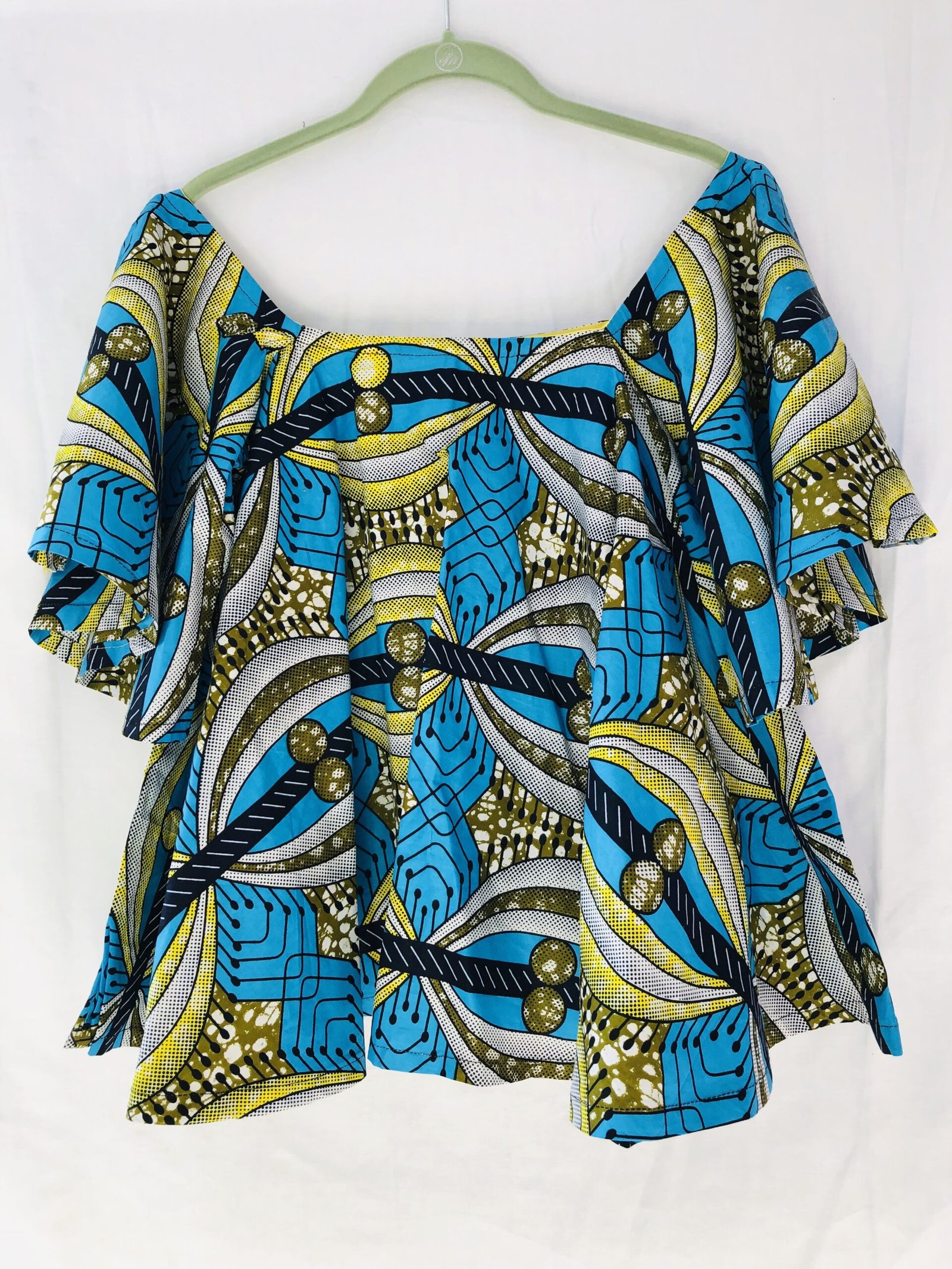 Chic Afriq Off-shoulder Ankara Top. Chic Afriq Off-shoulder Ankara Top.
